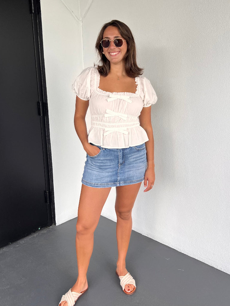 CELINE PEPLUM BOW BLOUSE IN WHITE