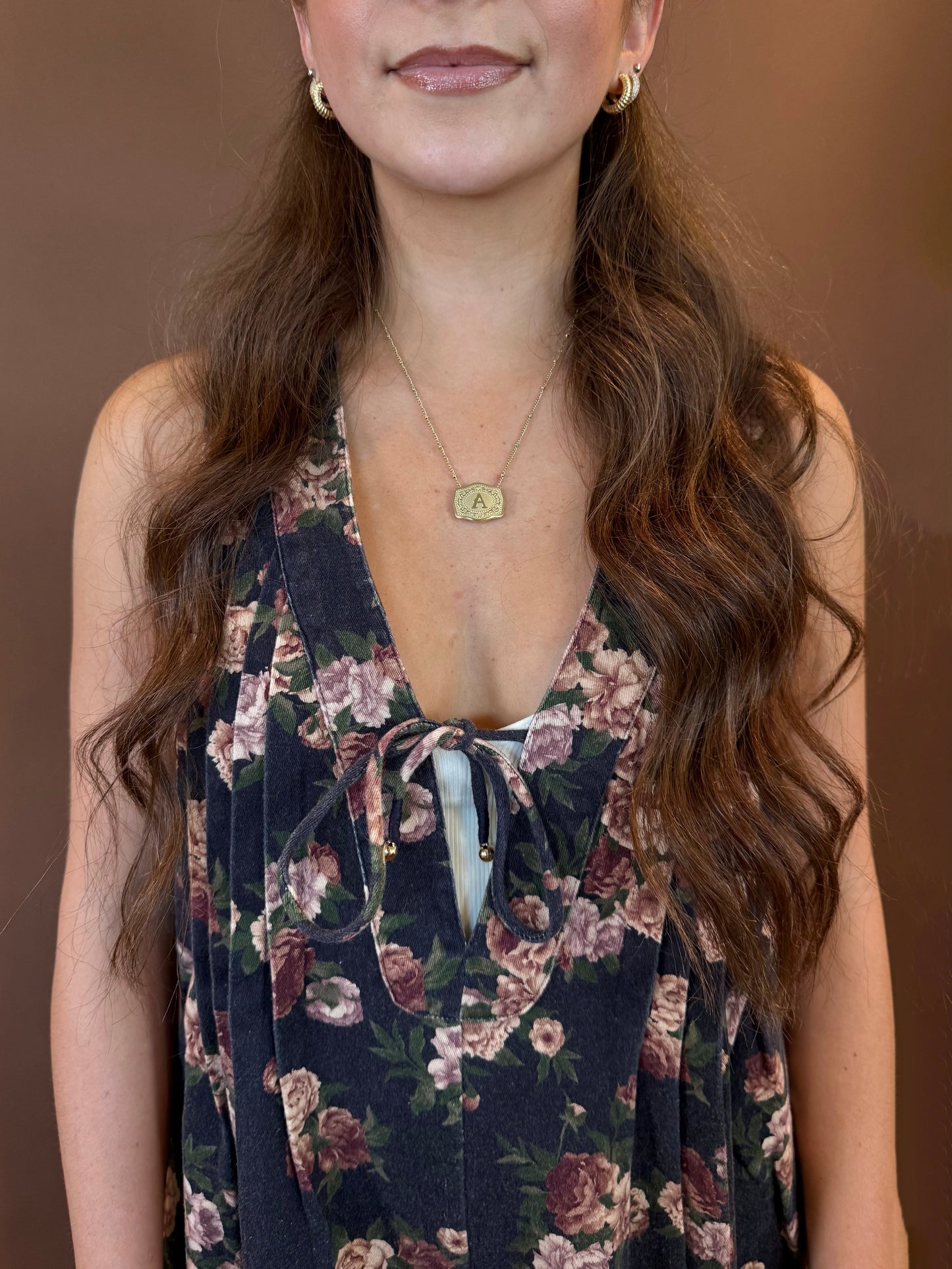 Meadow Multicolor Floral Sleeveless Romper in Navy