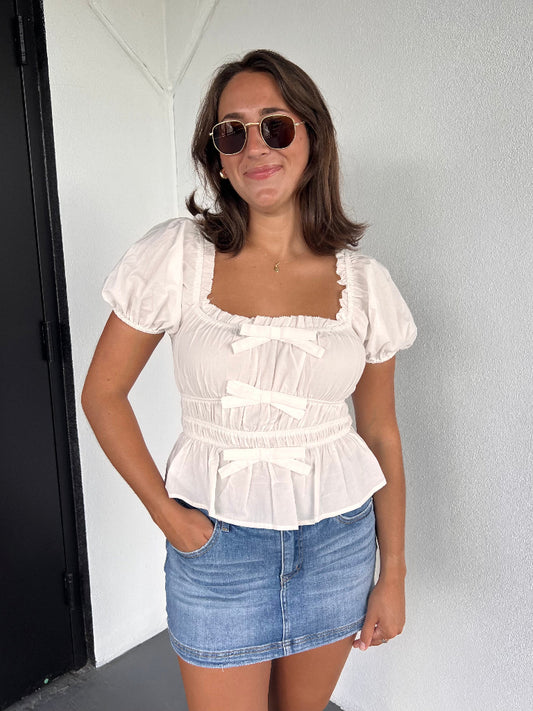 CELINE PEPLUM BOW BLOUSE IN WHITE