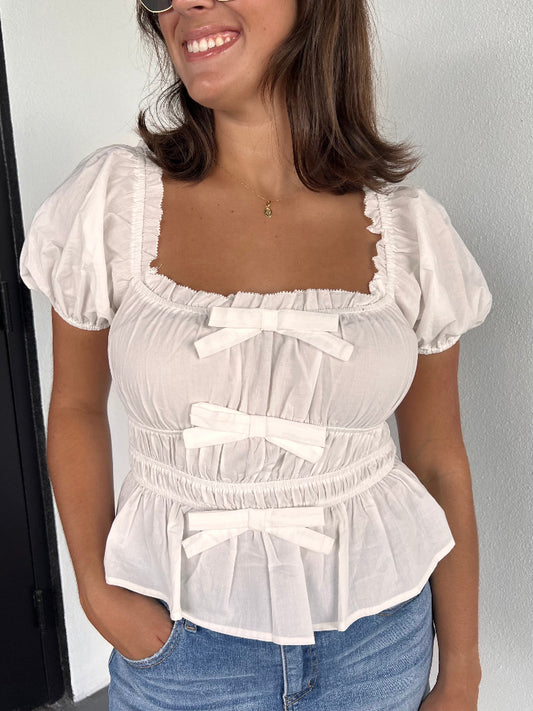 CELINE PEPLUM BOW BLOUSE IN WHITE