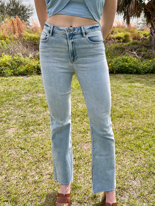 Presley Bootcut Jeans with side slit and raw hem in light wash