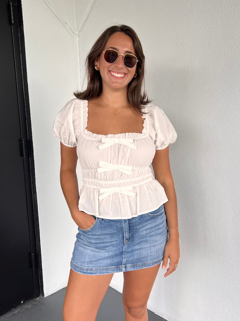 CELINE PEPLUM BOW BLOUSE IN WHITE