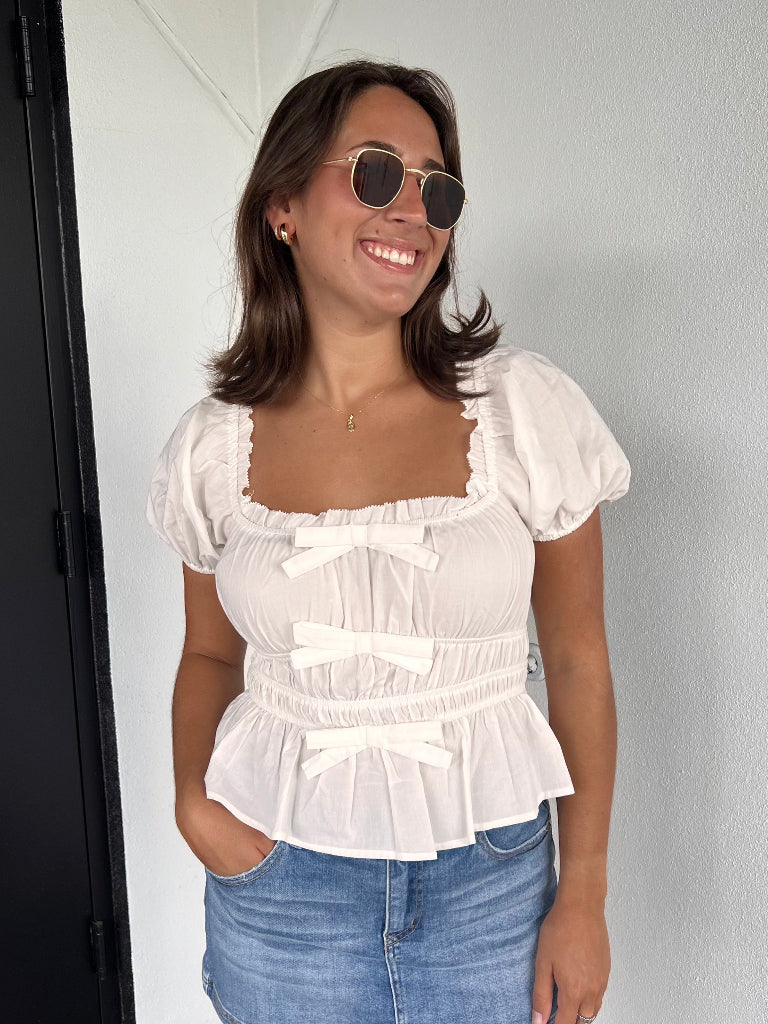 CELINE PEPLUM BOW BLOUSE IN WHITE