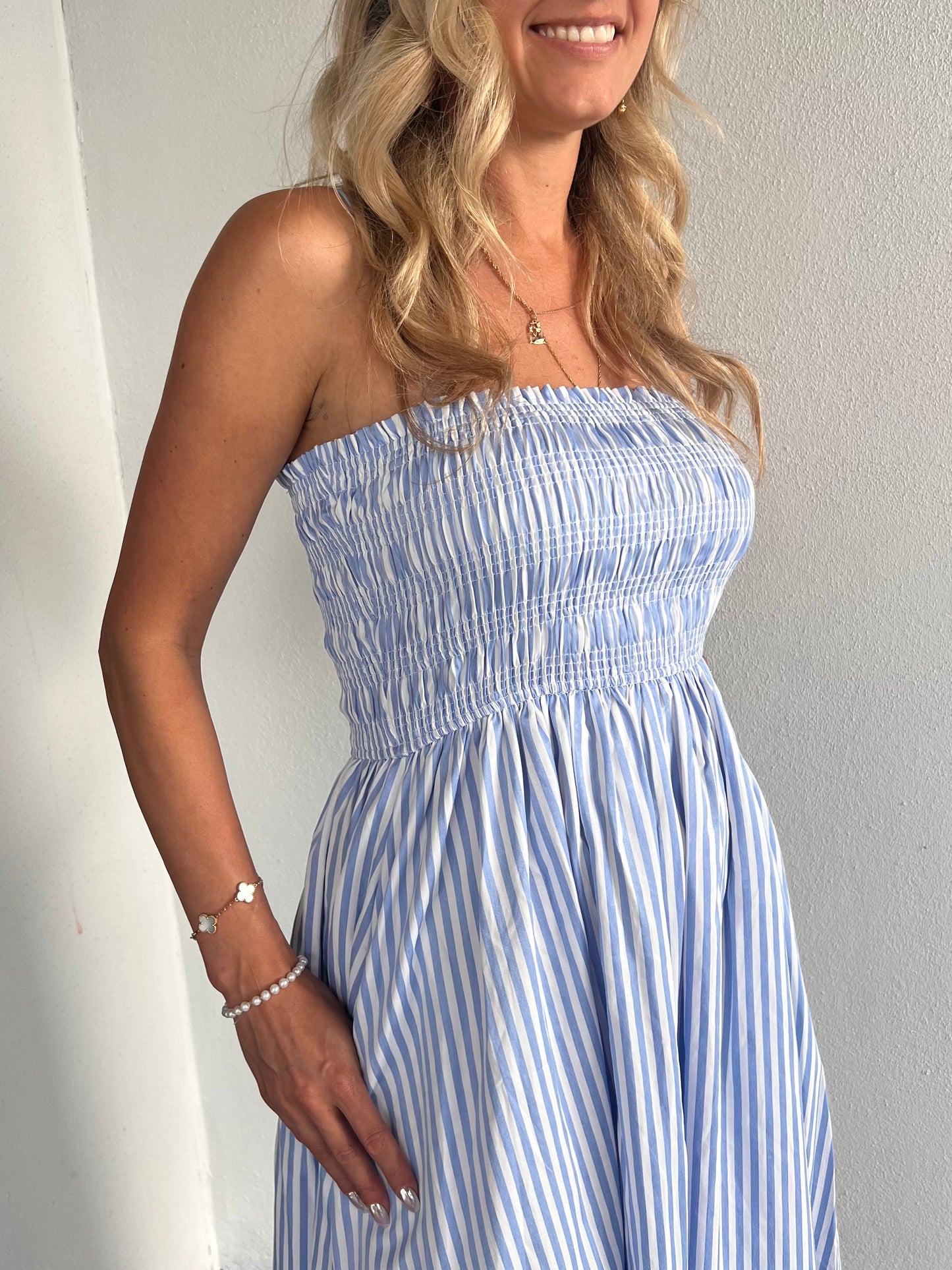 RALEIGH SMOCKED STRIPED MIDI DRESS IN BLUE