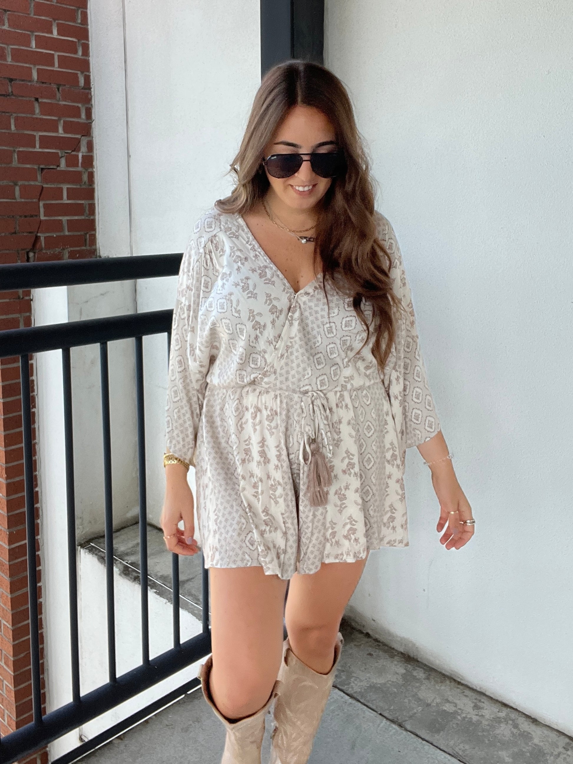 Kinsley Cream Printed Romper with tassel belt