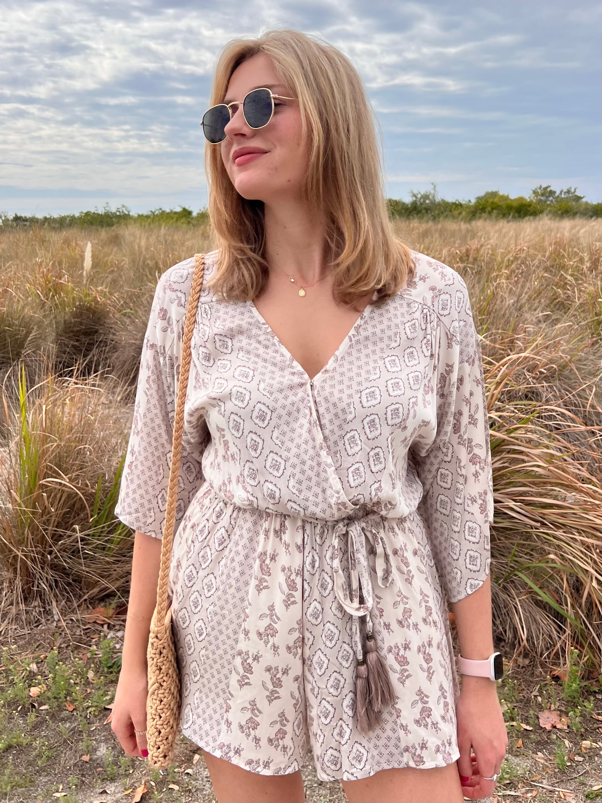 Kinsley Cream Printed Romper with tassel belt