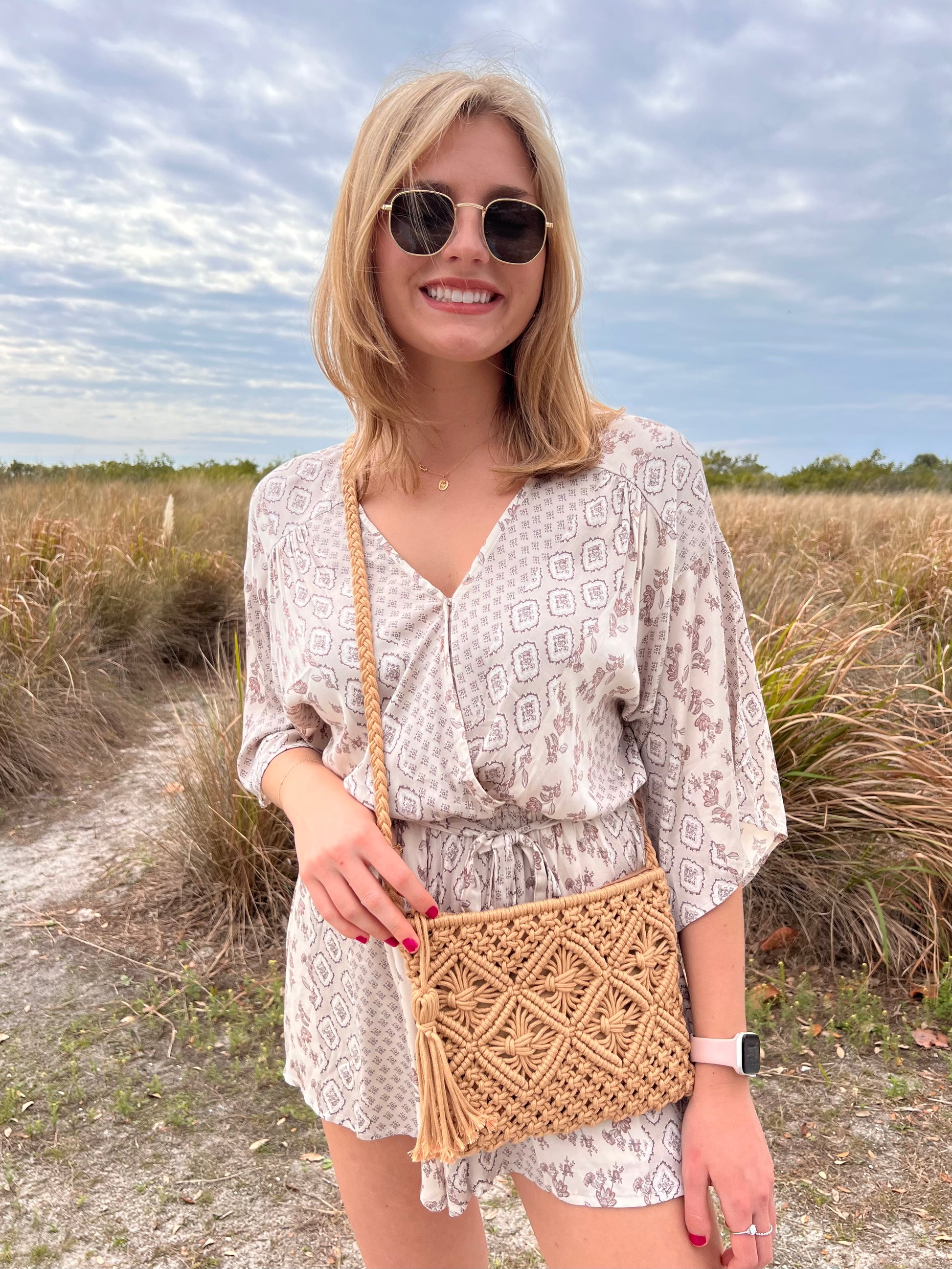 Kinsley Cream Printed Romper with tassel belt