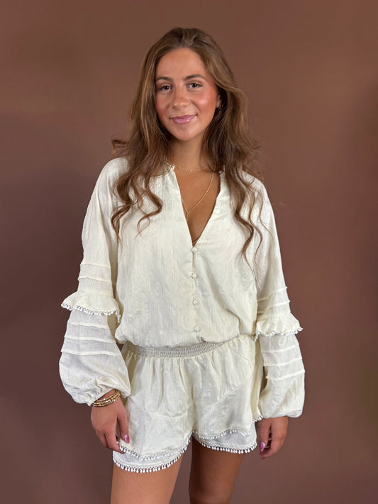 Aurora Long Sleeve Smocked Ruffle Romper in Ivory