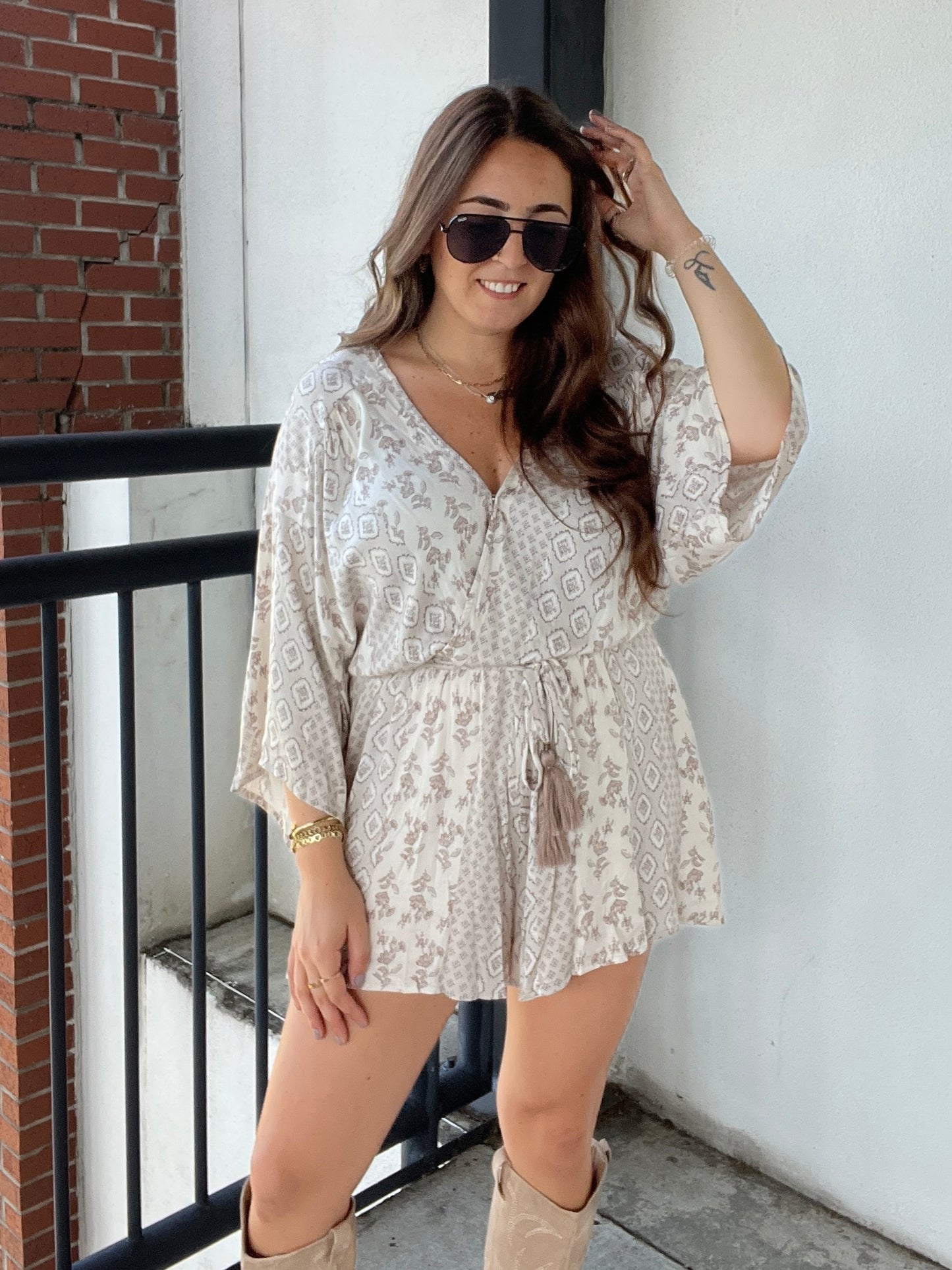 Kinsley Cream Printed Romper with tassel belt