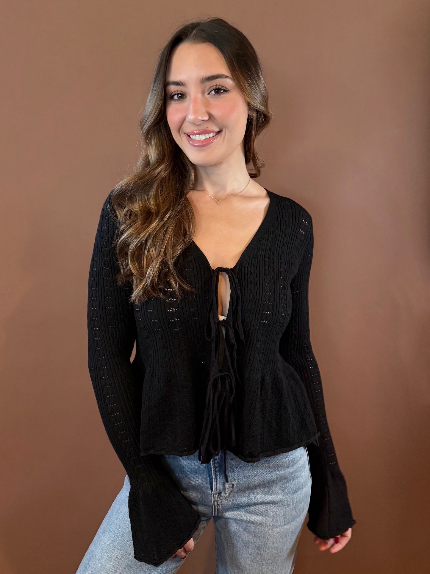 Lorelai Front Tie Bell Sleeve Peplum Sweater in Black