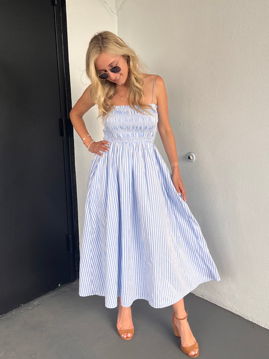 RALEIGH SMOCKED STRIPED MIDI DRESS IN BLUE