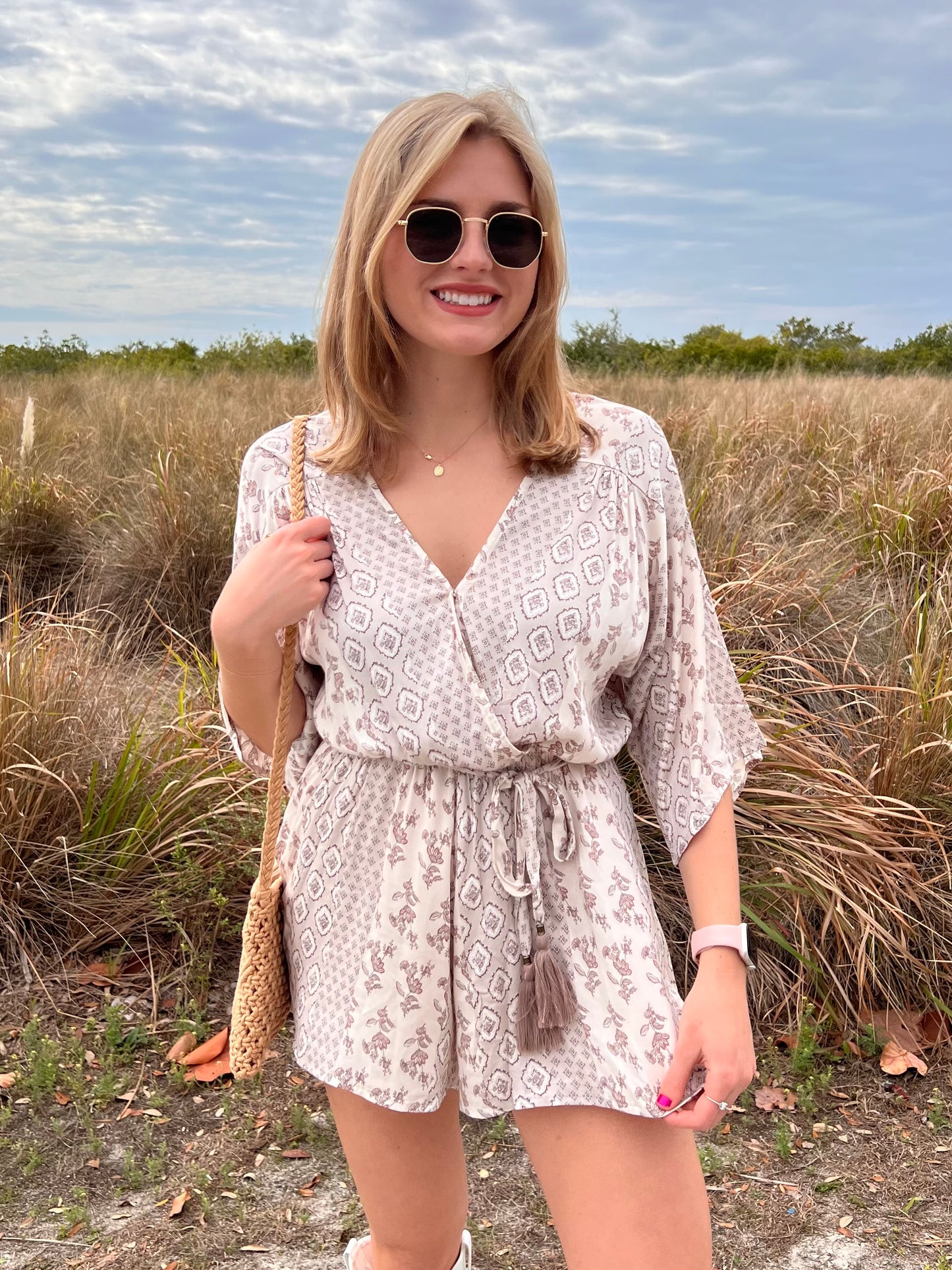 Kinsley Cream Printed Romper with tassel belt