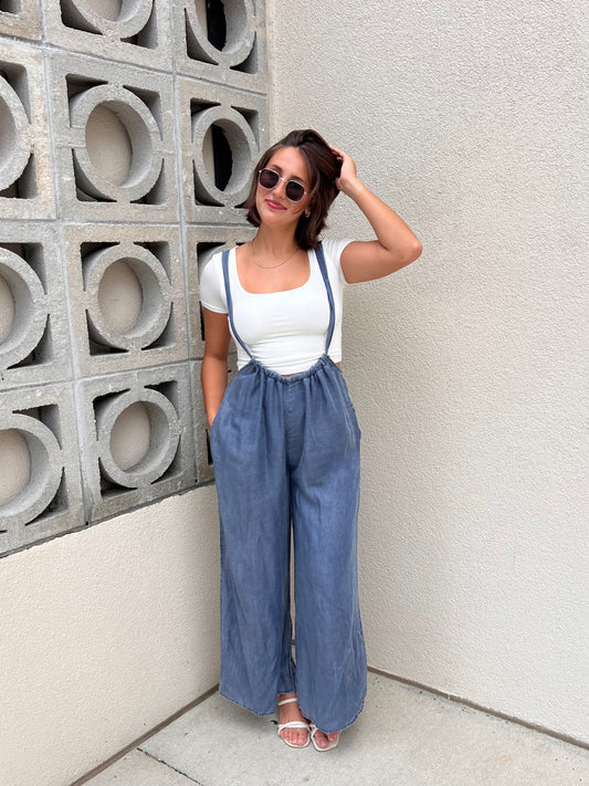 ALEXIS SUSPENDER JUMPSUIT IN DENIM