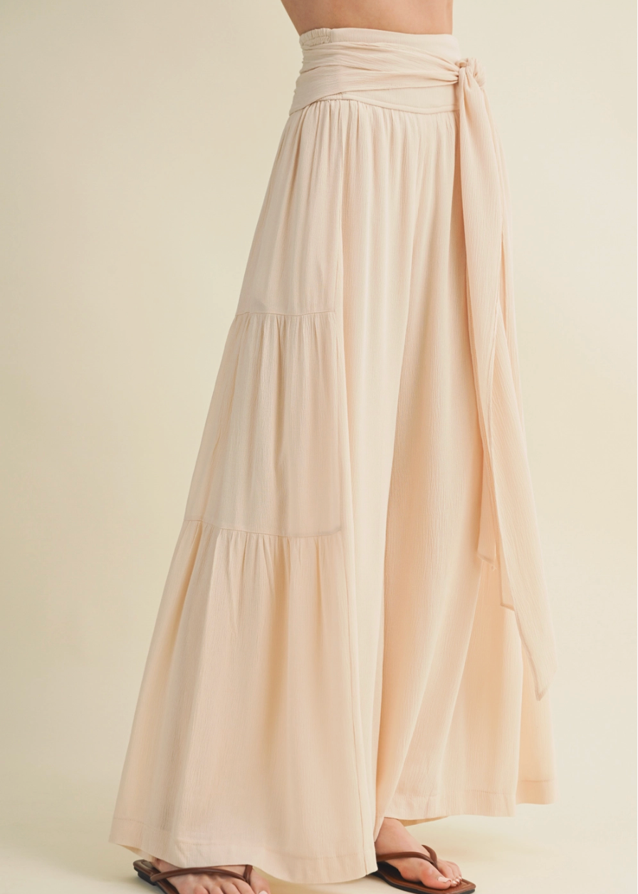 Beige long skirt with a plain background