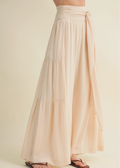 Beige long skirt with a plain background